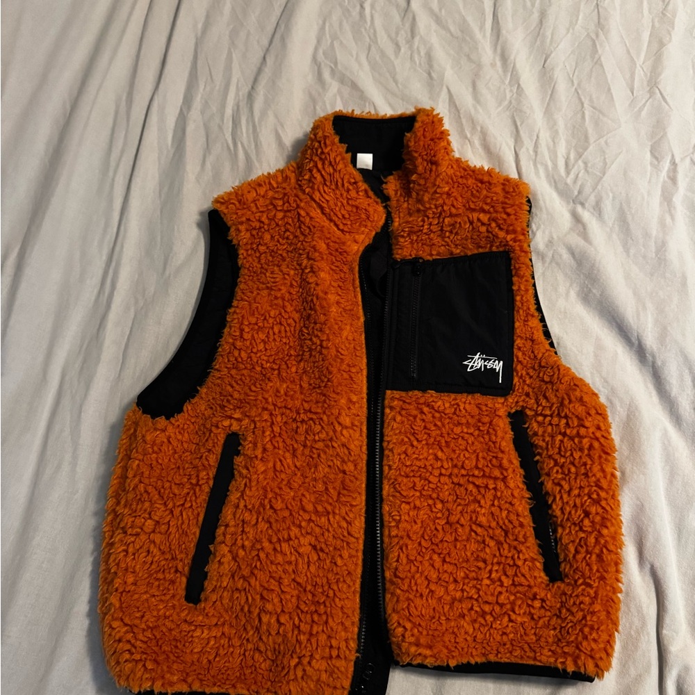 Mint condition orange stussy vest. Worn about 4 times. 
Just not my style.
